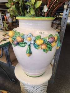 lot 225 image: Large Urn with raised garland of fruits and flowers. Floral included