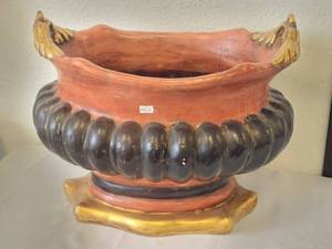 lot 117 image: Footed oval shaped cache pot accented in earthtones and gold trimmed