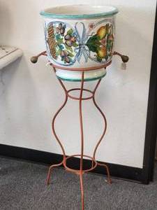lot 139 image: Plums, lemons, and pomegranates adorn this hand painted cache pot that sits in a plant stand