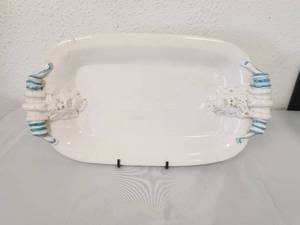 lot 229 image: Unique serving platter with scrolled handles and Renaissance style Grotesque figures at each handle (9 x 15). matches bowls in lot #231