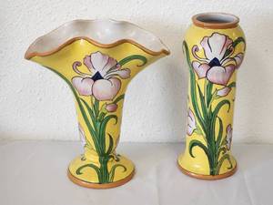 lot 226 image: Pair of hand painted complimentary vases (both  12). Pastel floral on a bright yellow background
