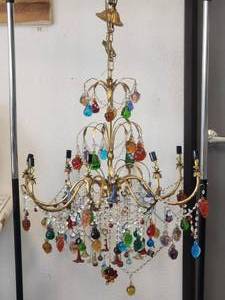 lot 12 image: Beautiful 8 light brass chandelier dripping in handblown multi color Murano glass fruits. Made in Italy