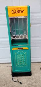 lot 1 image: SENSIO CANDY DISPENSER MODEL XJ-13707 WITH LIGHT AS SHOWN.