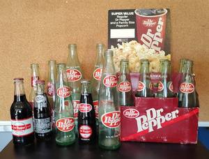 lot 55 image: DR. PEPPER COLLECTIBLE BOTTLES AND MORE AS SHOWN.