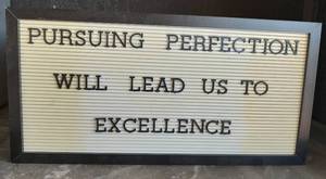lot 93 image: DECORATIVE SIGN IN STYLE SHOWN.