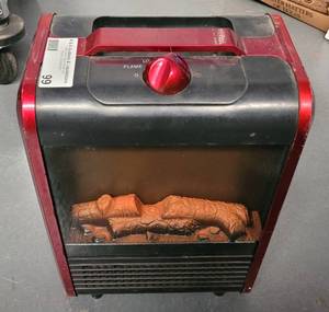lot 99 image: POWER ZONE MINI FIREPLACE HEATER AS SHOWN.