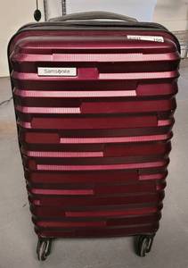 lot 100 image: SAMSONITE HARD SHELL TRAVEL SUITCASE AS SHOWN.