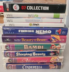 lot 118 image: WII GAMES AND DVDS AS SHOWN.