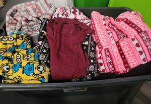 lot 121 image: CONTAINER LOT OF ASSORTED CLOTHING AS SHOWN. NICE MIXED LOT SOME MAY HAVE TAGS.