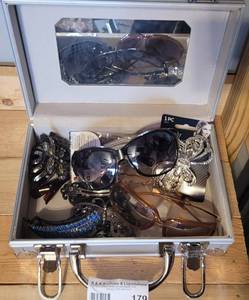 lot 179 image: HAIR ACCESSORIES AND SUN GLASSES AS SHOWN.