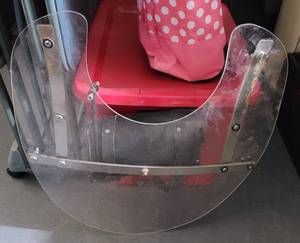 lot 210 image: HARLEY DAVIDSON WINDSHIELD WITH BAG AS SHOWN.
